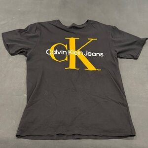 Calvin Klein Black Tee with Bold Yellow CK Logo